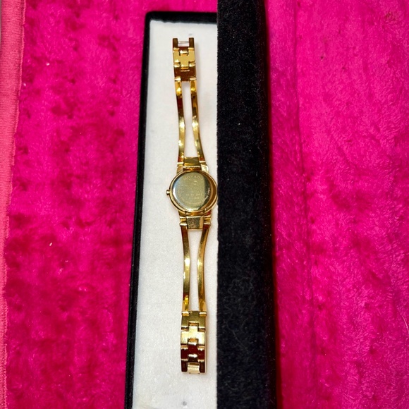 Movado Women's Gold Watch with Black Dial - Picture 3 of 9